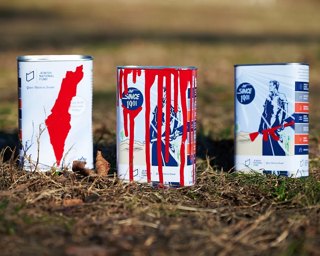 Three JNF donation boxes painted with red
